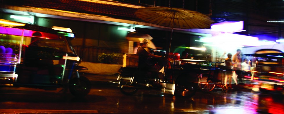 Tuk-tuks, street vendors and flower sellers are part of the fabric of the Bangkok night.