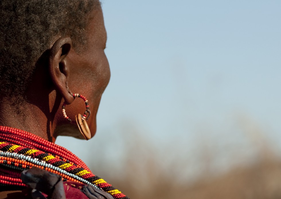 Women wear a brass earring to indicate they are married.