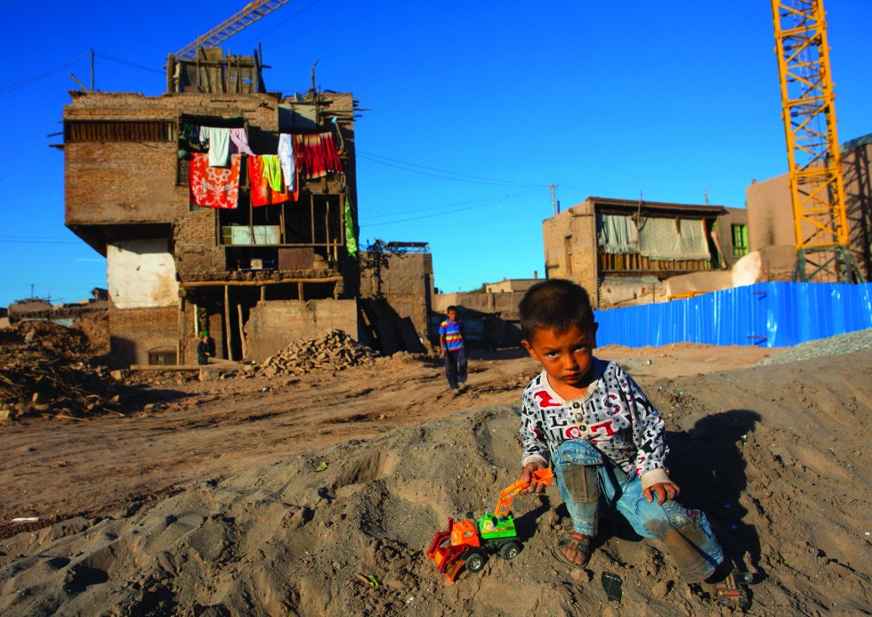 Kashgar: Many houses have already been destroyed by Chinese bulldozers. The government initiated a plan to rebuild the area. Officially this is due to seismic danger and unsanitary conditions. 65,000 Uighur families must be relocated into suburban housing projects. The Uighurs now make up only 60% o