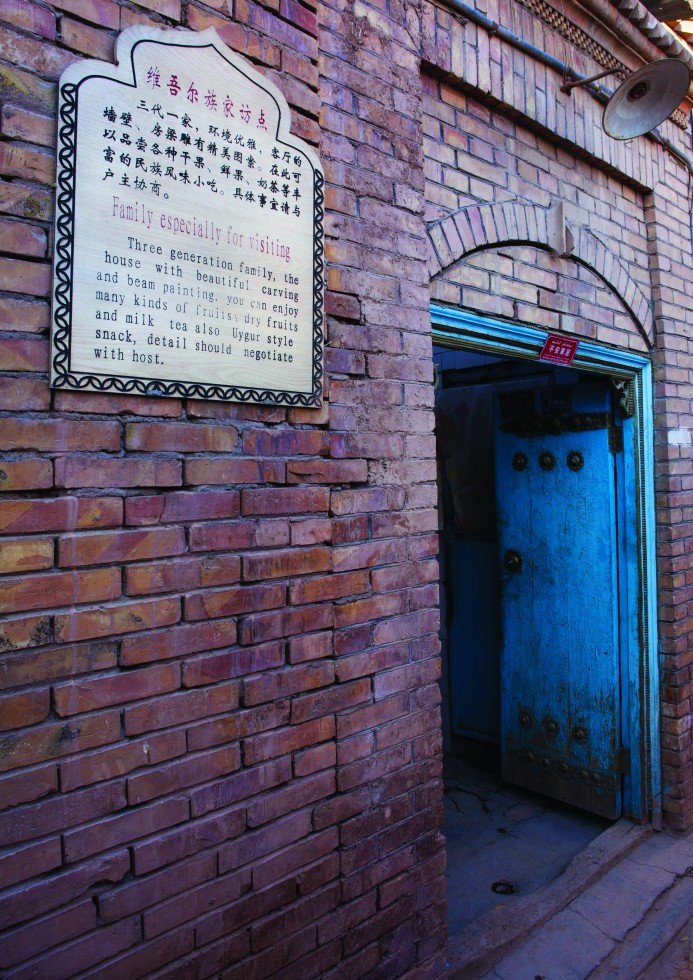Kashgar: A sign reads “Forbidden to tourists”. I break the law and find myself lost in a labyrinth of back streets in the middle of a Uighur marriage celebration. The men take turns dancing while the women are busy preparing the party at the house of the betrothed.