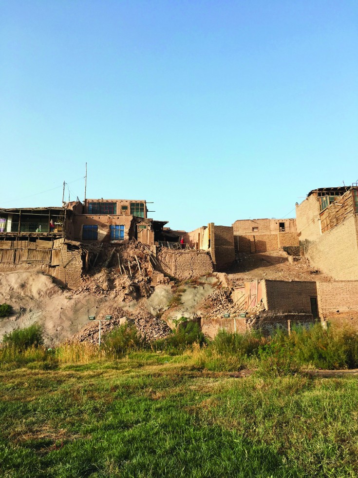 While much of the old town has been renovated, some parts have not. The crumbling walls of these mud-brick homes represent some of the last centuries-old architecture in Kashgar.