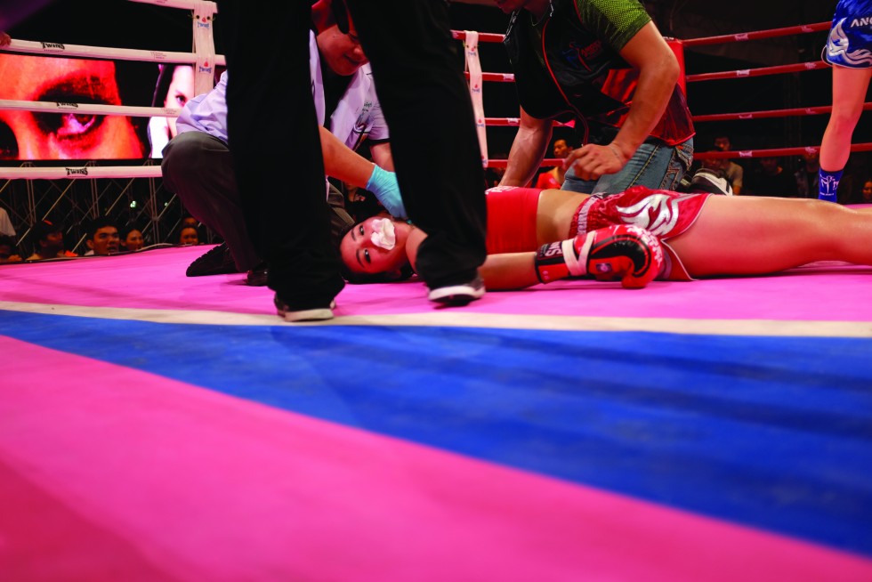 Sun Jing of China out cold after a sensational spinning back elbow knockout by Natalie Morgan at Angel Fight.