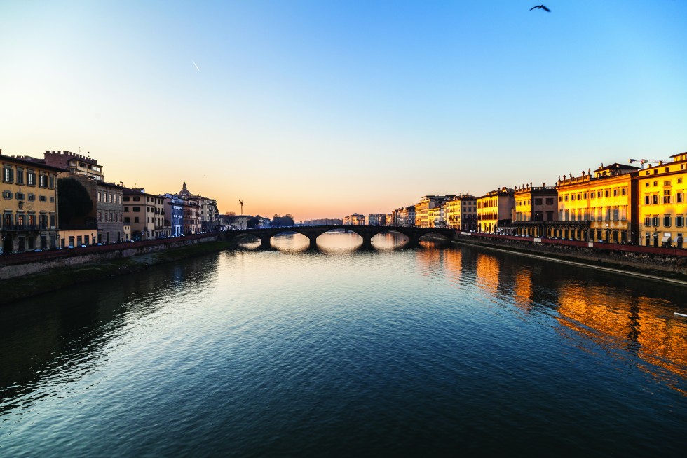 Florence, Italy: For us the creeping darkest spring of present memory; the sun casts long shadows as birds fly home.