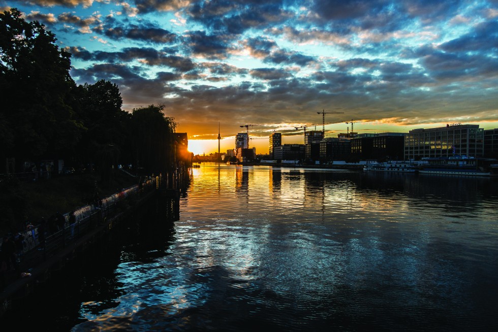 Berlin, Germany: Life’s symphony hitting crescendo clash of colour, liquid hymn slowly tongued while living, dead.