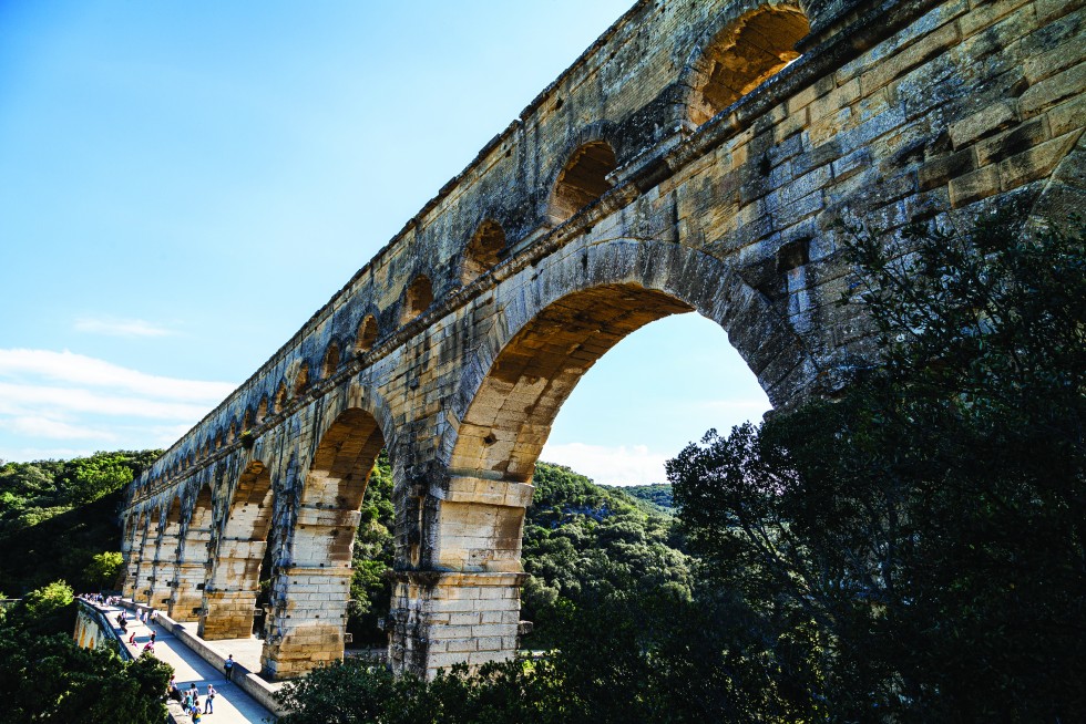The Pont du Gard, a Roman aqueduct built in the 1st century and remarkably preserved. Corn fields near Uzès.
