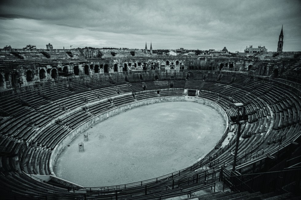 Roman colosseum and tower in Nîmes, a main access point to the region.