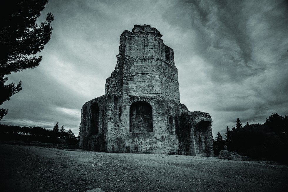 Roman colosseum and tower in Nîmes, a main access point to the region.