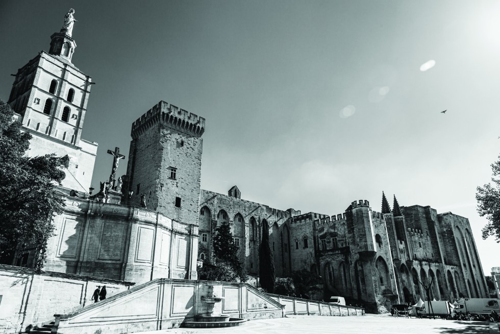 The Palais des Papes, a complex once designed to house rival popes, and a school group visiting the famous unfinished bridge in Avignon, another access city to the region.