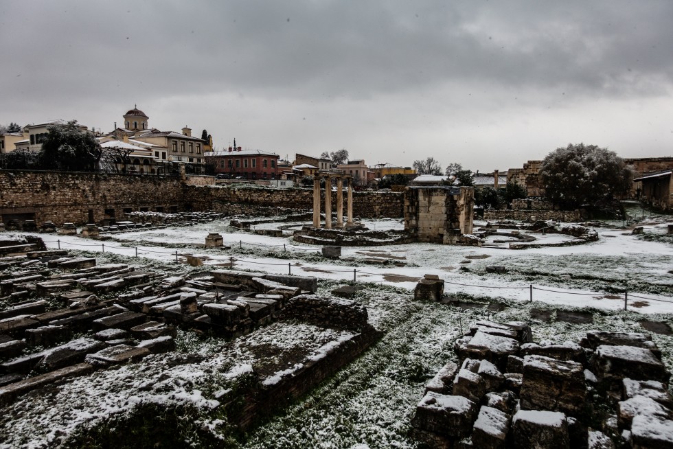 Classical ruins in the snow.