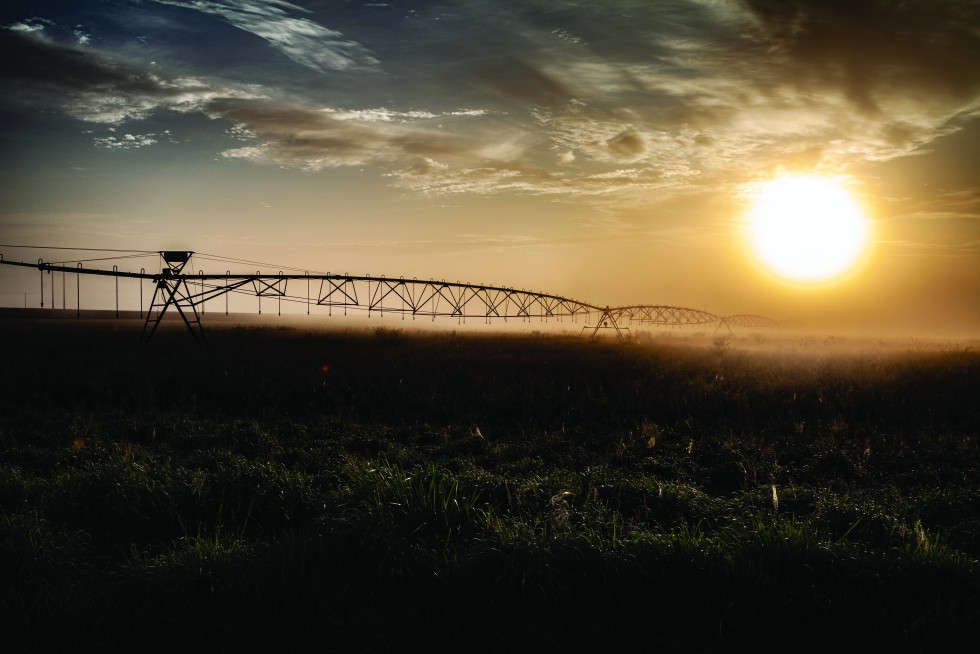 Industrial agriculture and gaps in the clouds.