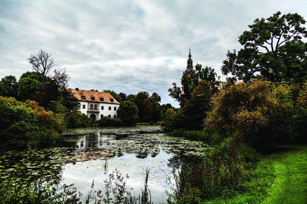 Hunting lodge and castle reflected in Muskau Park.