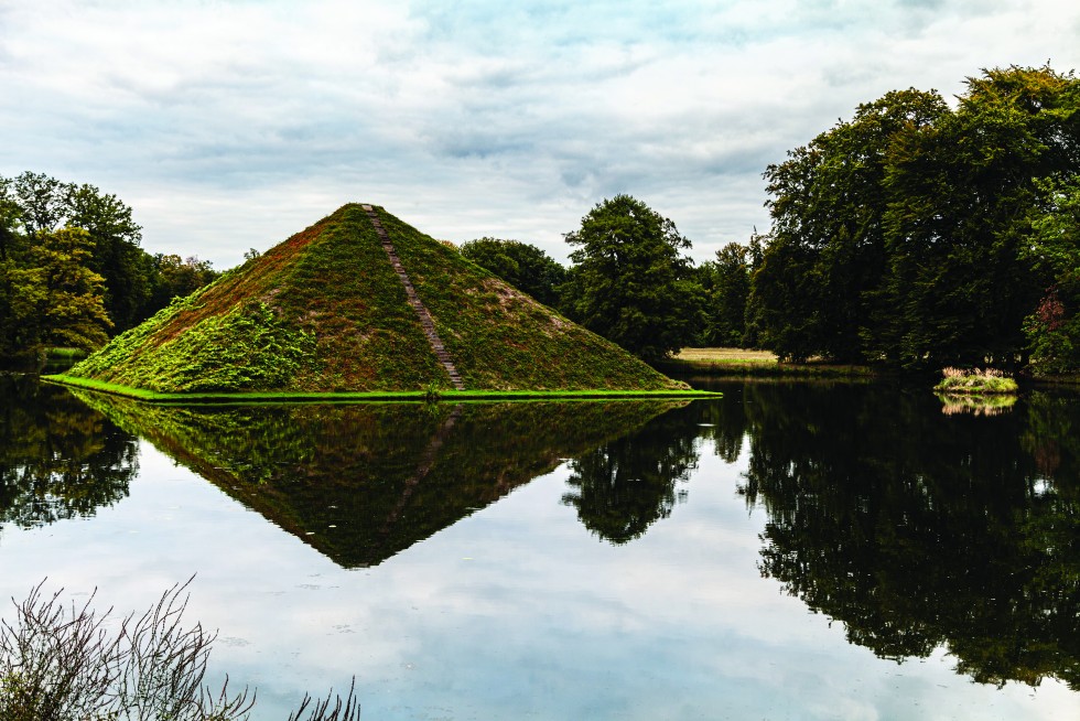 Pyramids reflected in the park in Cottbus resemble floating diamonds.