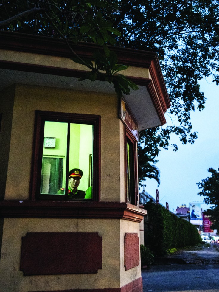 A security guard at dusk.
